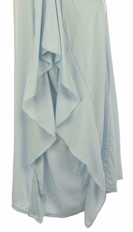 Aqua ruffled side cape in 100% viscose, stylishly designed for elegance and comfort, perfect for versatile layering.