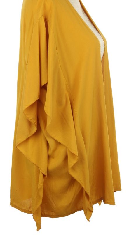 Mustard Victoria Ruffled Side Cape draping elegantly, made from soft 100% viscose, perfect for layering in style.