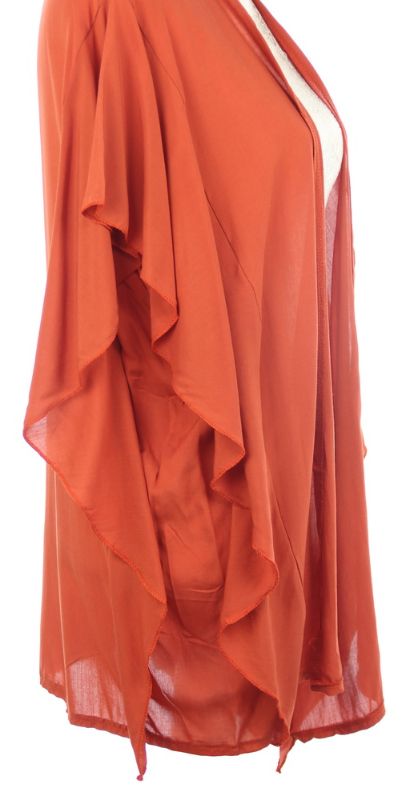 Elegant rust cape with ruffled side, 100% viscose, fits chests up to 117cm, perfect for any occasion.