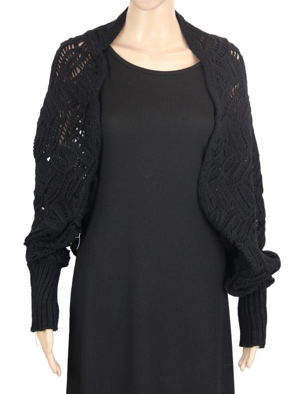 Elegant black crochet shrug made from 100% cotton, perfect for layering and adding style to any outfit.