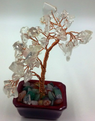Small Clear Quartz Gemstone Tree, 15cm tall, enhances harmony and energy in any space with its unique crystal design.