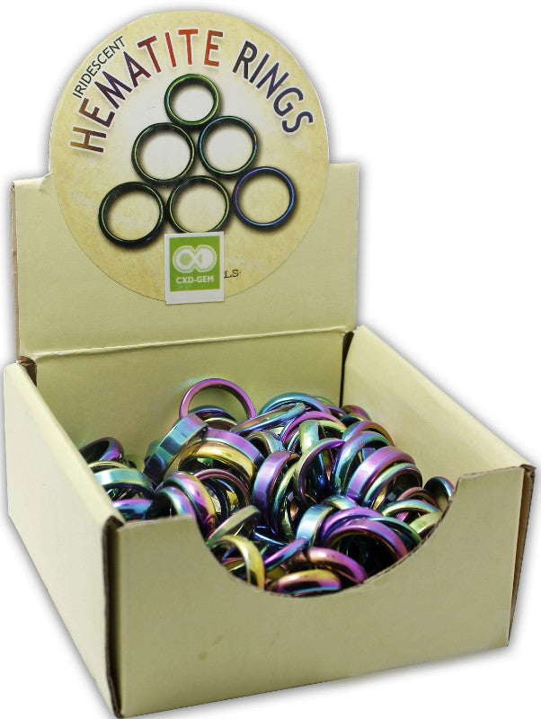 Pack of 100 Iridescent Hematite Rings in mixed sizes, showcasing vibrant color changes and ideal for unique jewelry designs.