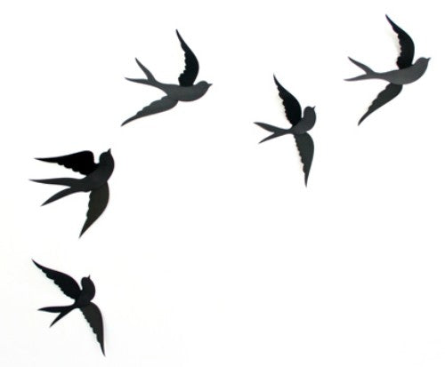 Elegant black polypropylene wall art set of three swallows, symbolizing freedom and perfect for stylish home decor.