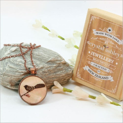 Elegant circle pendant necklace in mother of pearl with filigree design, 30mm diameter, on a 75cm chain, perfect for any occasion.