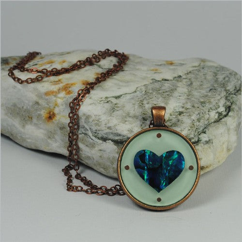 Vibrant Paua Heart Green pendant necklace, 30mm, on a 75cm chain, showcasing ocean-inspired colors and unique craftsmanship.