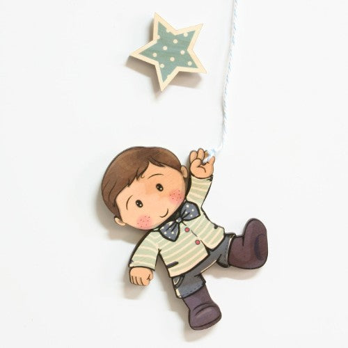 Whimsical pine wall art featuring a boy joyfully holding a balloon, perfect for children's rooms and igniting creativity.