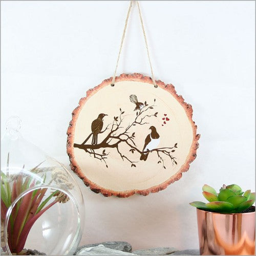 Wood slice wall art featuring birds on a tree, crafted from premium veneer, ready to hang; size 155mm x 145mm.
