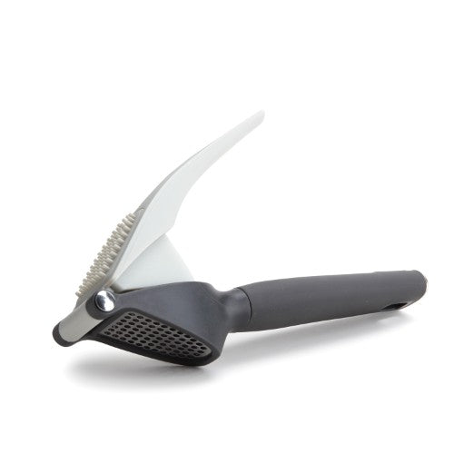 Compact and sturdy garlic press with ergonomic handle, easily crushes cloves and simplifies cleaning for garlic lovers.