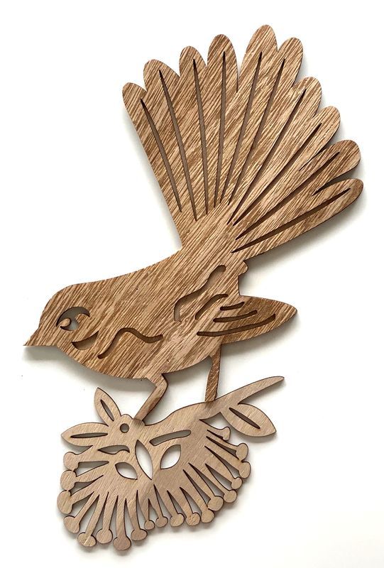Vibrant MDF wall art featuring a fantail bird on a Pohutukawa tree, ideal for enhancing any living space.