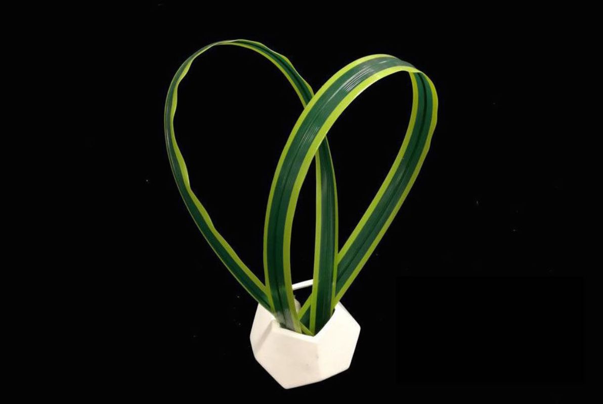 Lifelike Artificial Flax plant, perfect for adding elegance and greenery to any space without maintenance hassles.