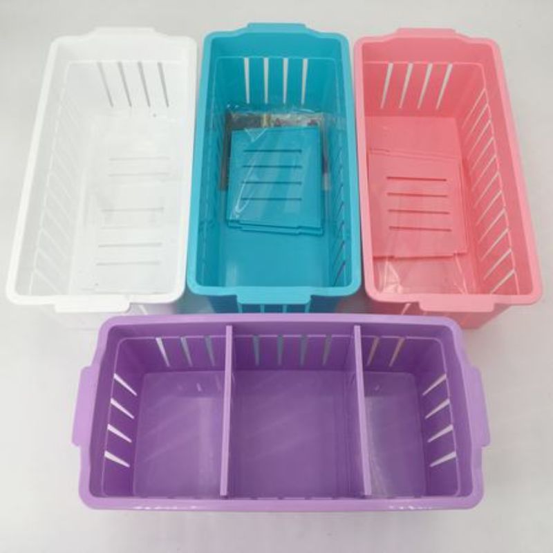 Set of 12 versatile plastic organizers, 31 x 15 x 10 cm, for efficient storage in various spaces.