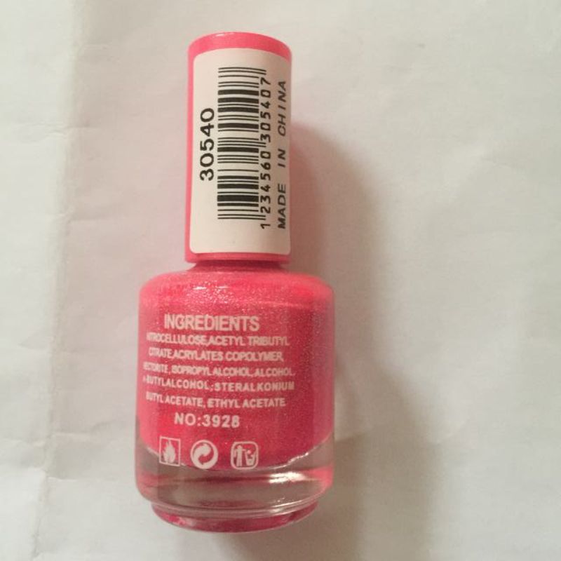 Set of 6 vibrant nail polishes in various shades, offering long-lasting, high shine, and quick-drying results.