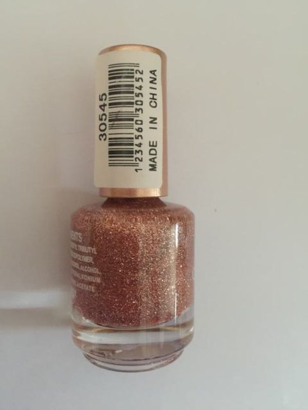 Set of 6 vibrant nail polishes in various colors, featuring a long-lasting, chip-resistant, and non-toxic formula.