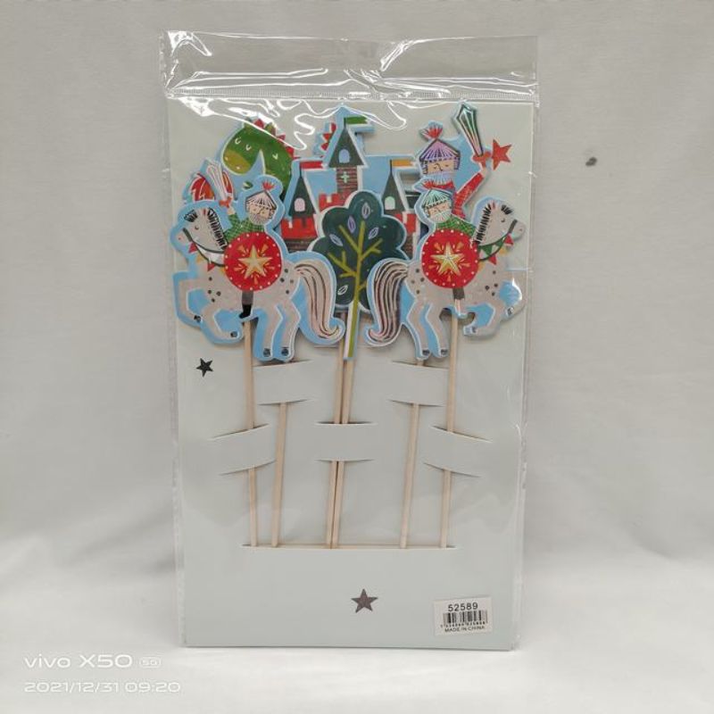 Colorful knight-themed decorations including banners and centerpieces for epic medieval party celebrations.
