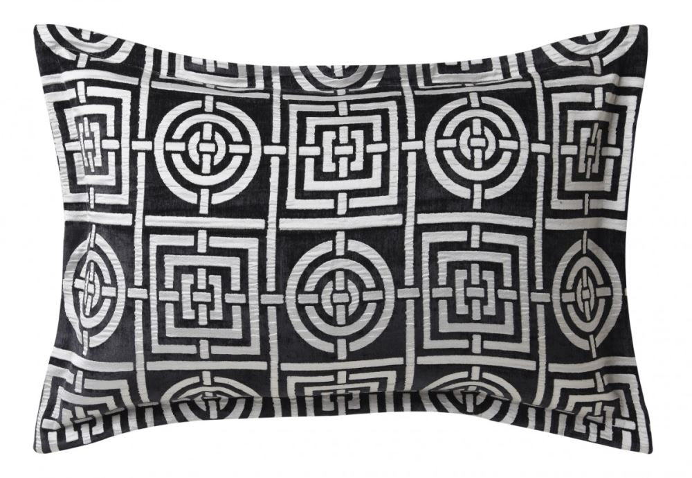 Queen duvet set featuring bold charcoal circles and squares, plush chenille fabric, and a contrasting silver printed reverse.