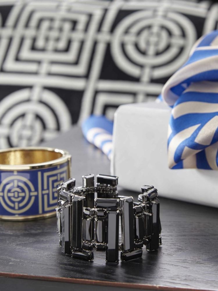 Queen duvet set featuring bold charcoal and white geometric designs with plush chenille texture and a silver printed reverse.