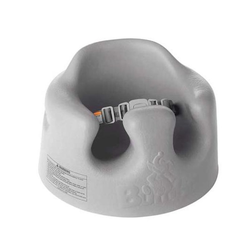 Bumbo Floor Seat in Cool Grey, designed for infants 3-12 months, offers safe, supportive seating to enhance sitting skills.