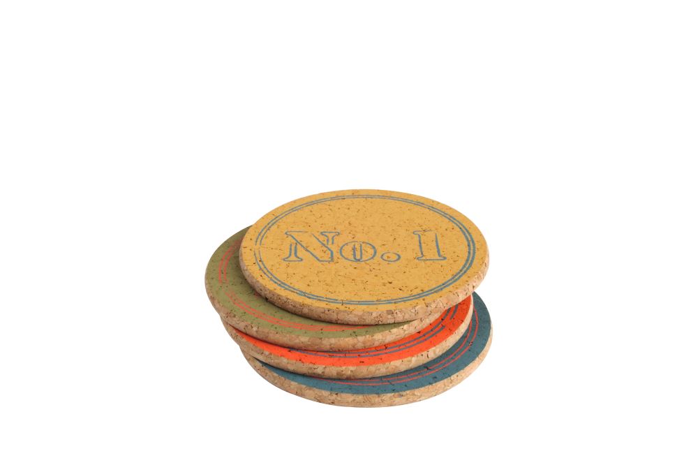 Set of 4 eco-friendly cork coasters with numbered designs, 100mm diameter, perfect for protecting surfaces and adding style.