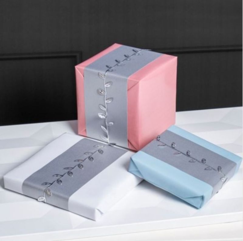 Premium baby pink wrapping paper roll, 50cmx50m, 80gsm, perfect for elegant gift presentation and versatile wrapping needs.