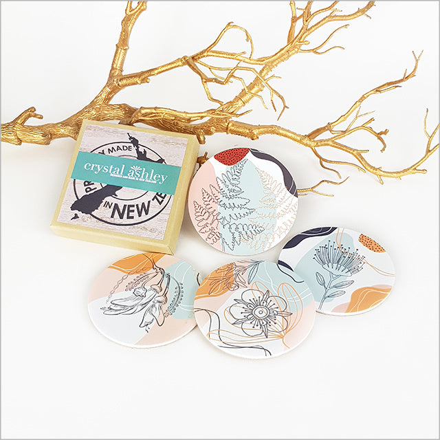 Vibrant floral design coasters made of acrylic with cork base, ideal for home decor and protecting surfaces.