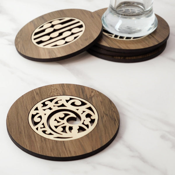 Elegant 10cm coaster made from reclaimed New Zealand River Rimu, featuring unique colors and intricate Pine inlay.