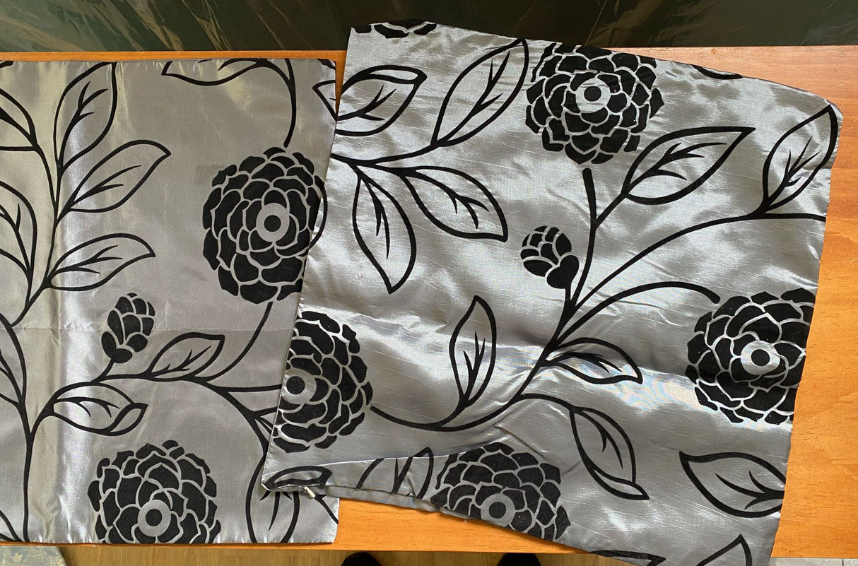 Set of 6 Floral Silver cushion covers featuring a floral pattern on one side and sleek silver on the other, crafted from premium satinee fabric.