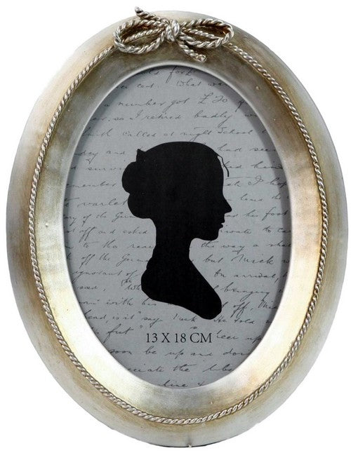 Ornate photo frame with intricate detailing, ideal for showcasing favorite pictures or certificates, measuring 17.7 x 2.2 x 22.7cm.