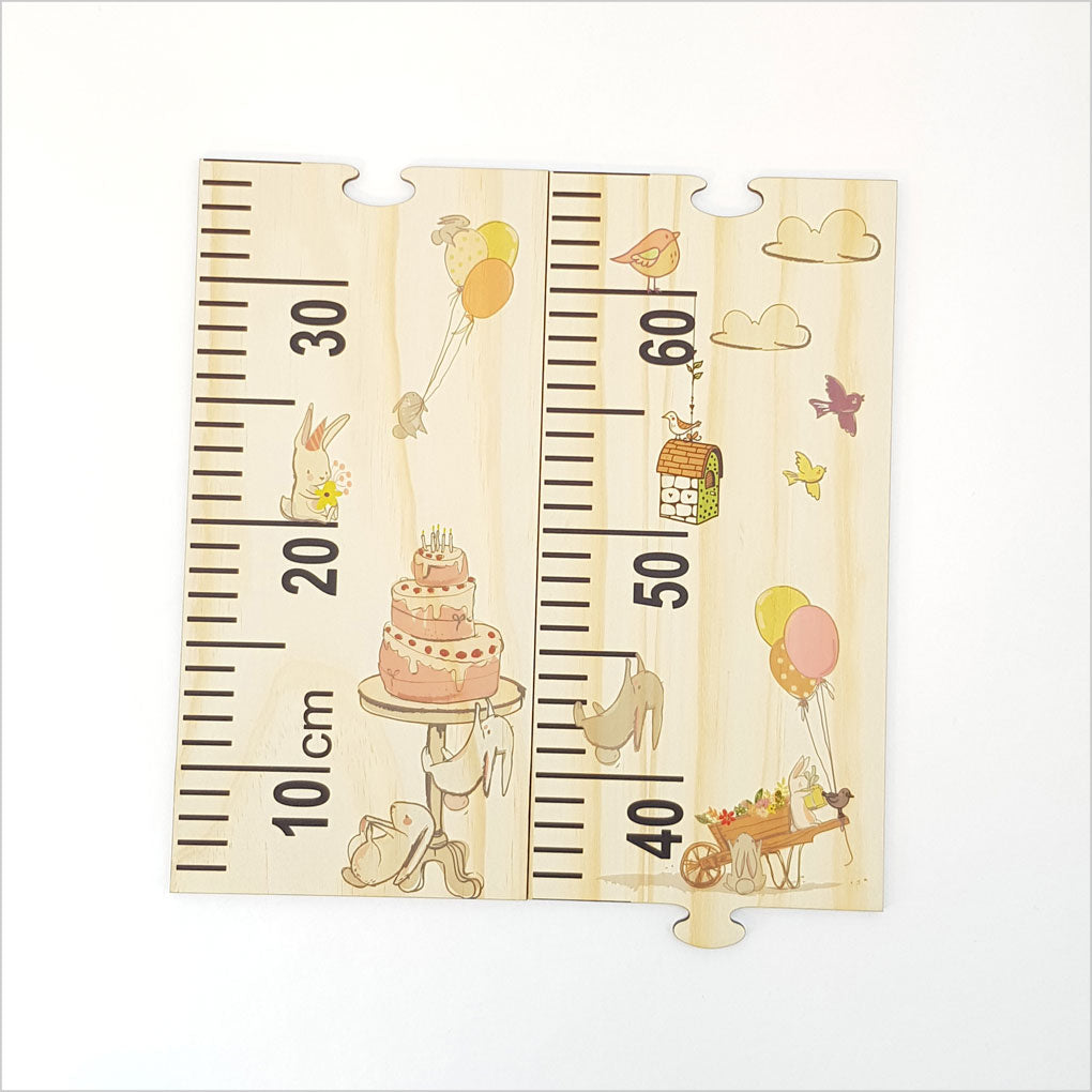 Woodland Party Growth Chart Ruler in eco-friendly pine, featuring charming animals and interactive puzzle pieces for fun growth tracking.