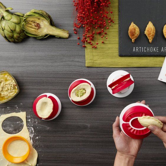Compact Pocket Maker by Chef'n for creating and sealing homemade appetizers effortlessly with scalloped edges.