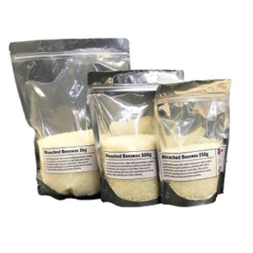Refined white beeswax pellets in 1 kilo, ideal for encaustic painting, candlemaking, and artistic DIY projects.