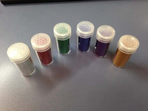 Ultra-fine royal blue glitter for crafting, enhancing projects with a vibrant, dazzling finish. Non-toxic and safe for all ages.