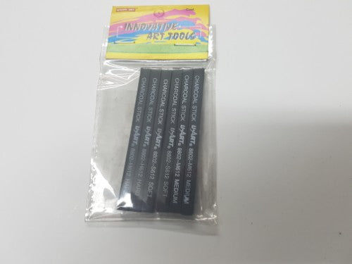 Set of 6 Das Compressed Charcoal sticks (80x6x6mm) designed for smooth, expressive drawing and varied shading techniques.