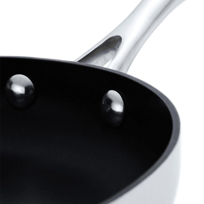 Scanpan CS Wok 32cm with Stratanium+ nonstick, five-layer aluminum, cool handles, and stylish stainless steel exterior.