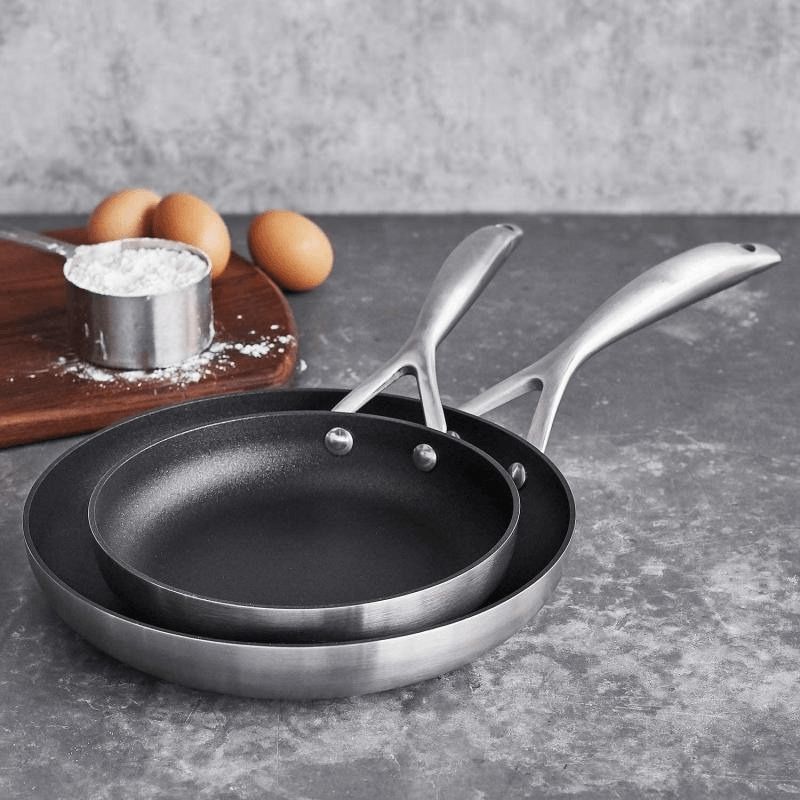 Scanpan 2 Piece Fry Pan Set featuring nonstick Stratanium+ technology and durable clad aluminum for superior cooking.