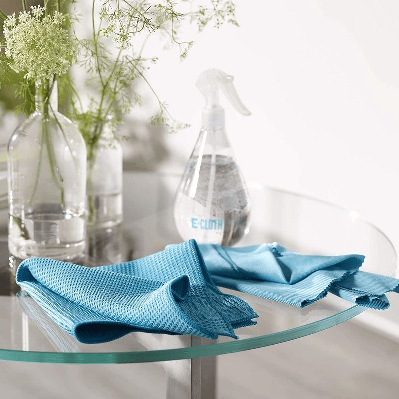 Clear E-Cloth water spray bottle with adjustable nozzle, holding 17.5 oz for easy cleaning with microfiber cloths.