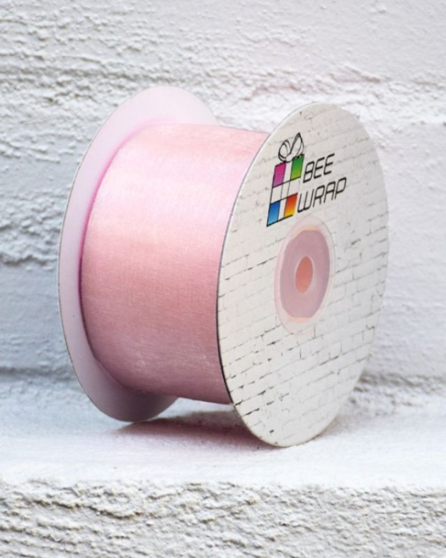 Dusty pink organza ribbon roll, 50mm wide, 50m long, perfect for crafting, gift wrapping, and elegant decorations.
