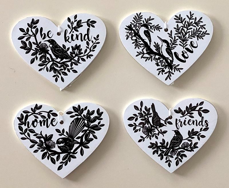Set of 12 MDF heart ornaments, each 12cm, featuring assorted designs perfect for home decor and heartfelt gifts.