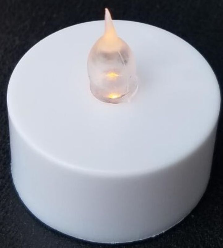 Battery-operated LED candle with flickering flame effect, perfect for cozy ambiance and safe for homes with children and pets.