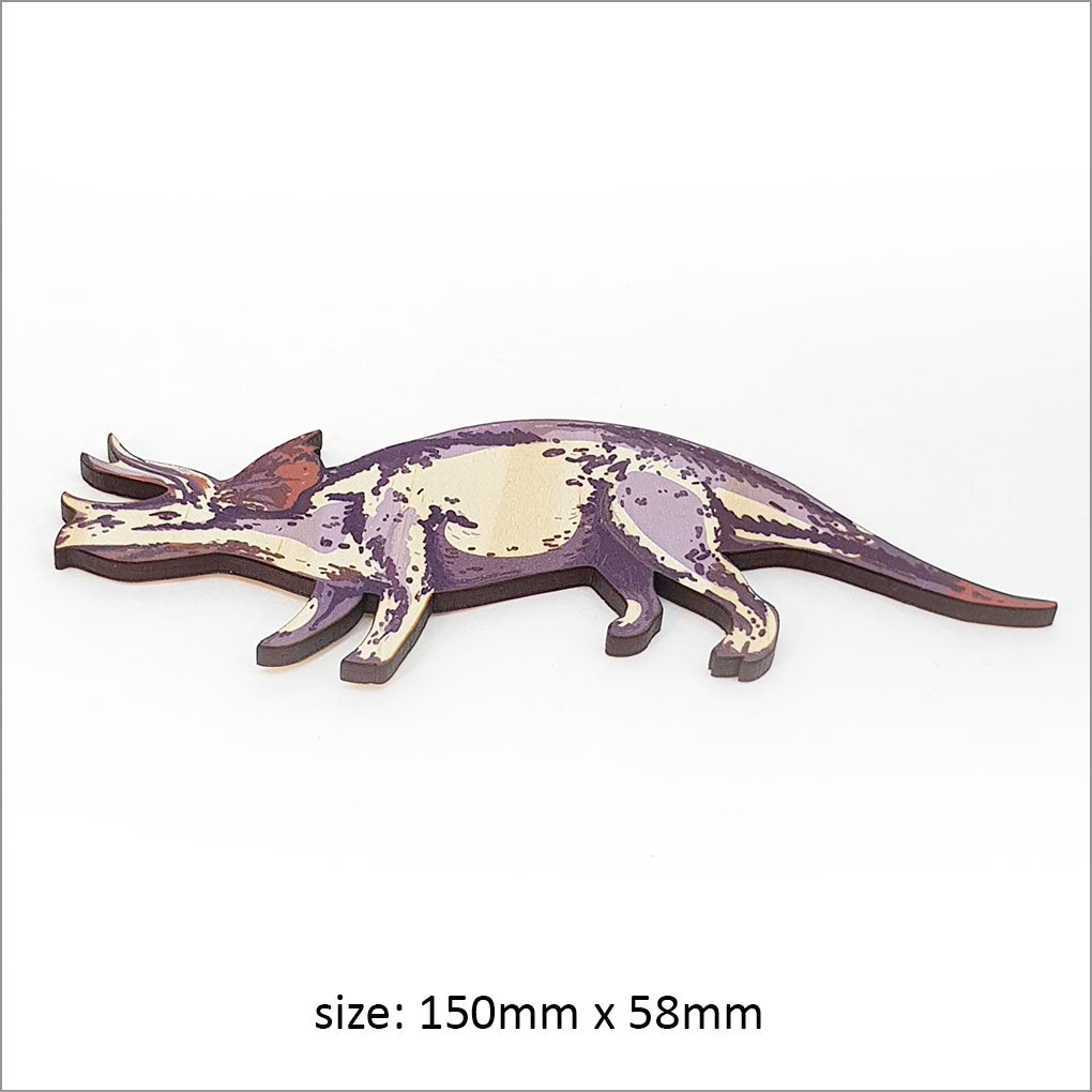 Colorful pine veneer wall art set featuring various dinosaurs, perfect for inspiring kids' creativity and room decor.