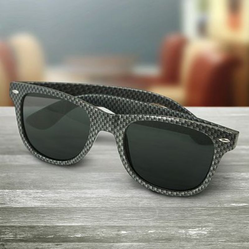 A set of 30 Malibu Premium Sunglasses in carbon fibre grey, featuring UV400 lenses and impact-resistant frames.