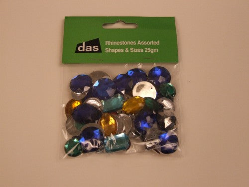 Assorted rhinestones in various shapes and sizes, perfect for DIY projects and adding sparkle to crafts.