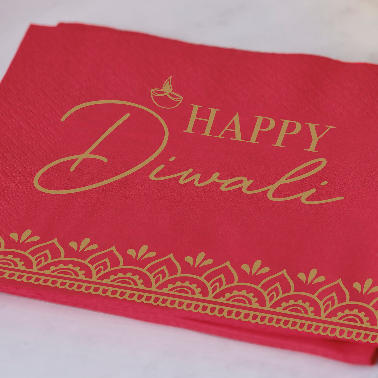 Elegant red and gold Beverage Napkins for Diwali, featuring intricate patterns to enhance festive gatherings.