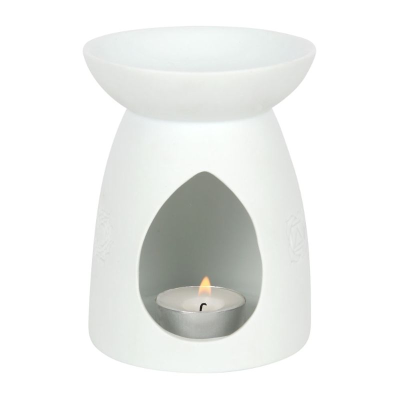 White ceramic oil burner featuring seven chakra symbols, designed for aromatherapy and enhancing home decor.