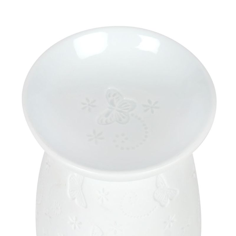 Elegant white ceramic butterfly oil burner, featuring delicate butterfly designs, perfect for melting wax and infusing calming scents.