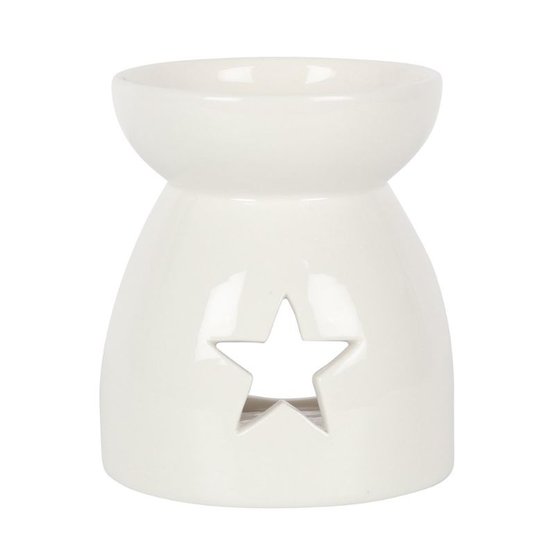 Elegant white ceramic oil burner with star cut-outs, perfect for creating a cozy ambiance while diffusing delightful scents.