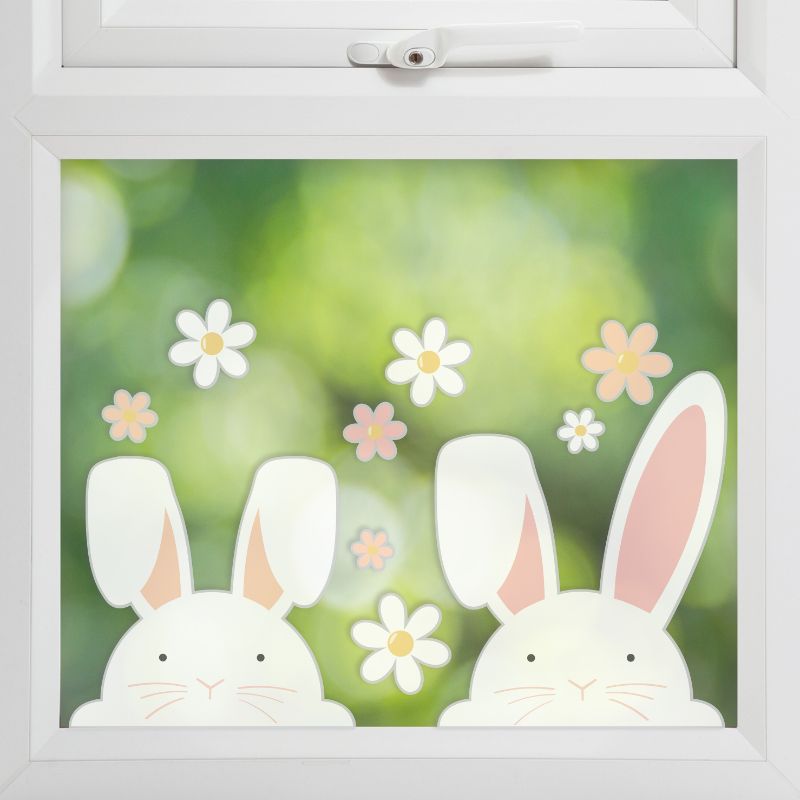 Colorful Easter window stickers featuring playful bunnies and flowers, perfect for festive home decoration.