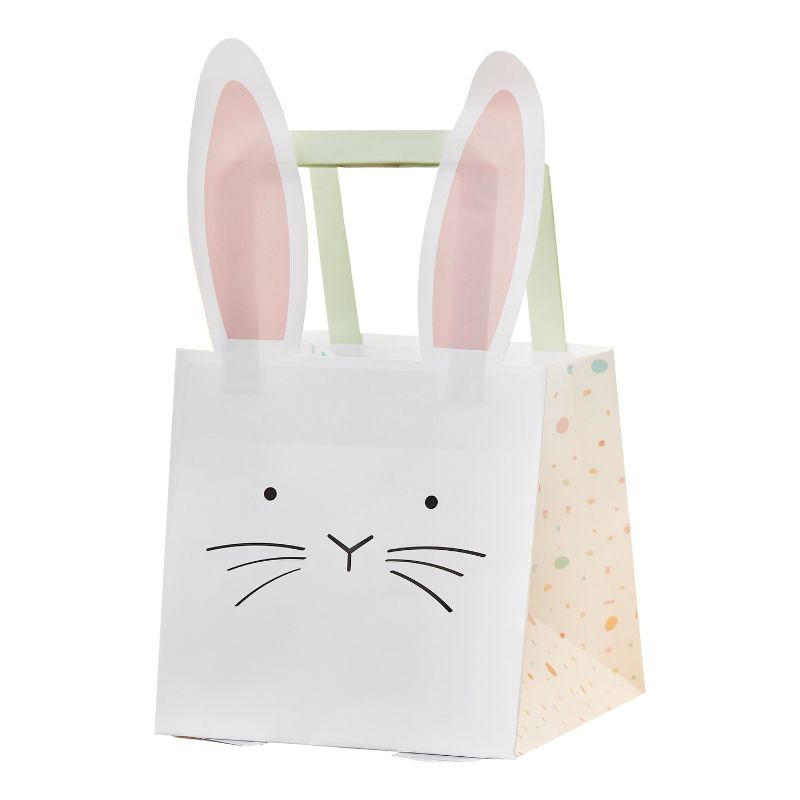 Bunny-themed Easter treat bags with pastel handles, ideal for filling with goodies, eco-friendly, and perfect for celebrations.