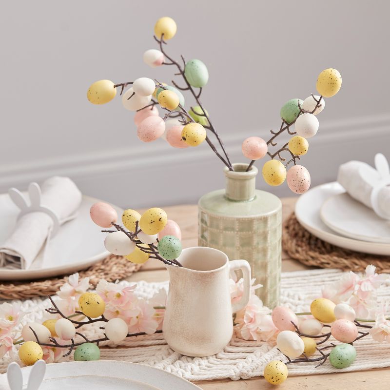 Pastel speckled egg stems by Ginger Ray, perfect for Easter centerpieces, featuring five 40cm artificial twigs with eggs.