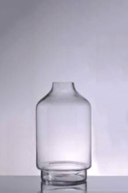 Set of 4 elegant clear glass narrow neck vases, perfect for single stems, enhancing any home decor.