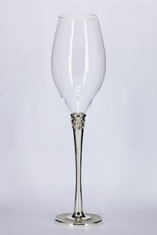 Elegant glass champagne goblets with glitter base, perfect for celebrations; set of 2, 290mm height, not dishwasher safe.